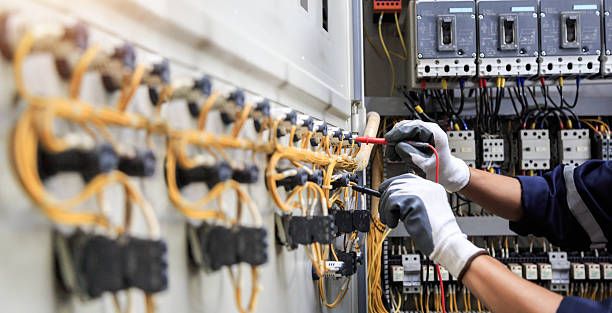 Professional Electrician technician working in Wood Village, OR